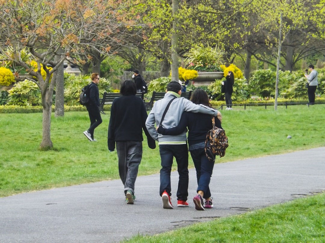 actors walking in park